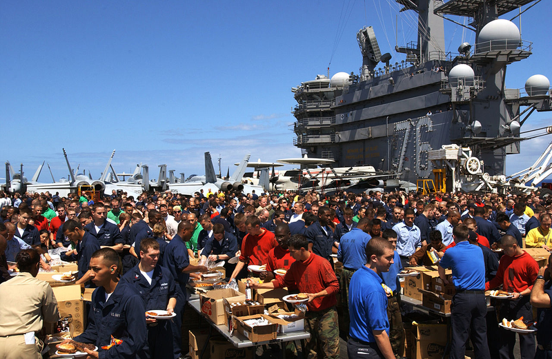 Illustration for article titled Steel Beach- When US Navy Ships Throw Giant Beach Picnic Parties